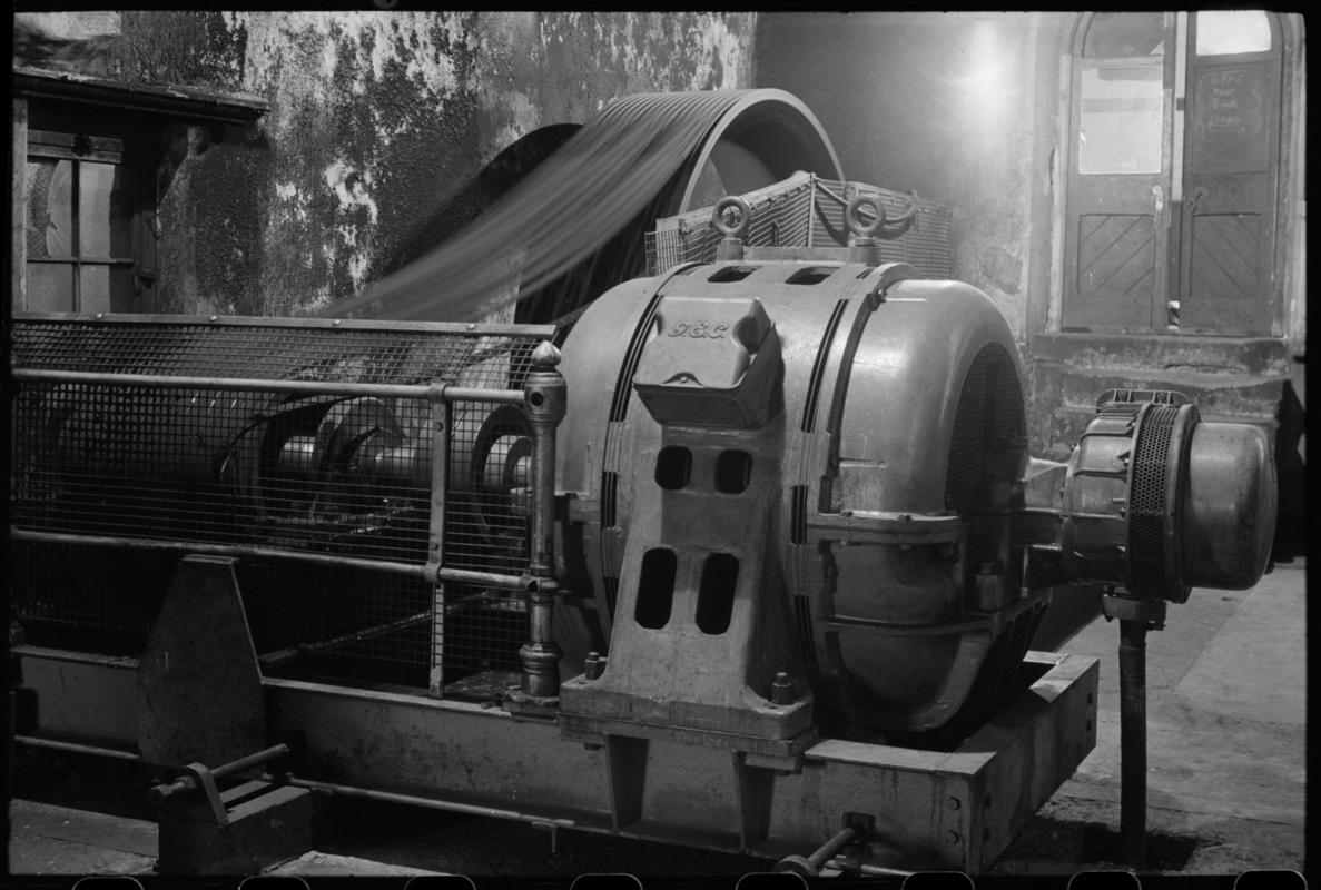 Black and white film negative showing a set of electric three-throw pumps on the Tillery Landing,  Tirpentwys Colliery.