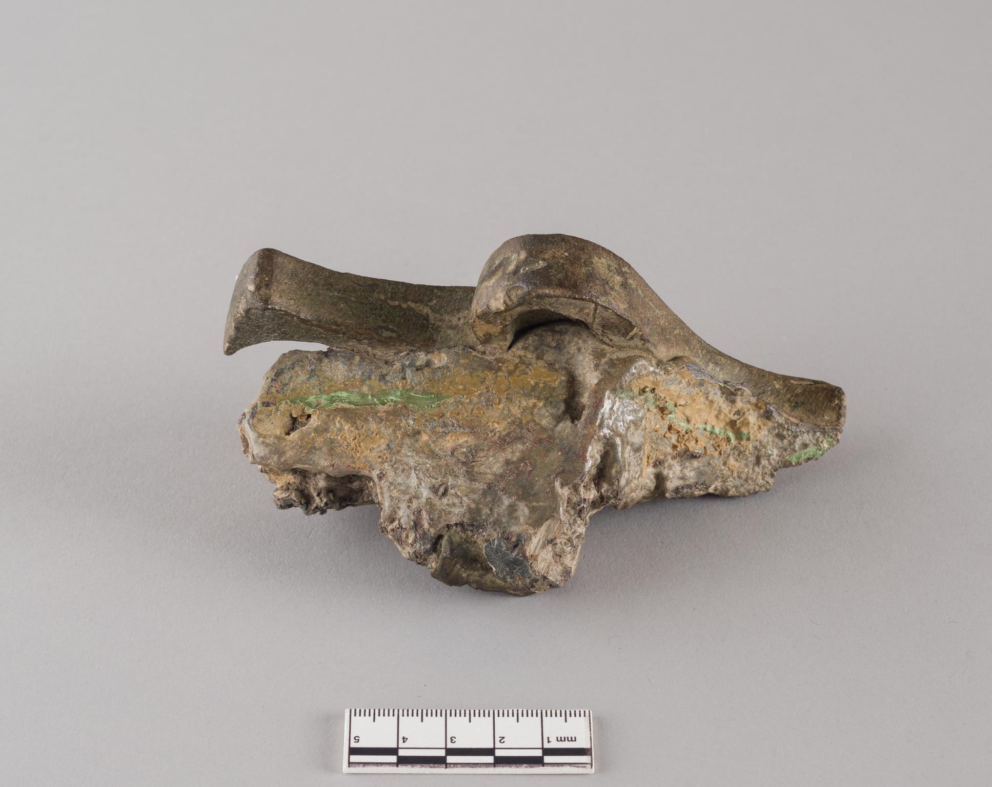 Roman copper alloy leaf stop from inscription