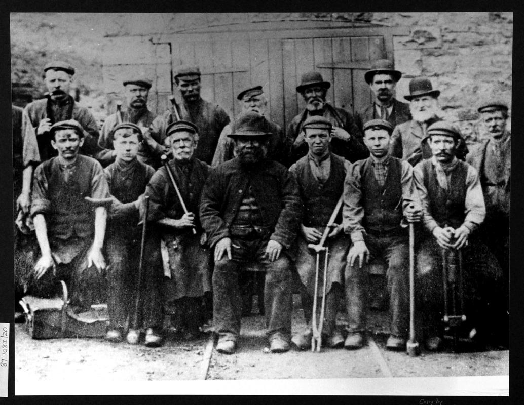 group of blacksmith shop workmen