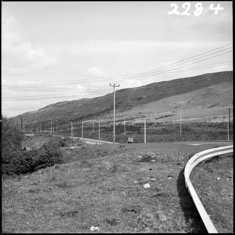 Black and white film negative showing the landscape surrounding Maerdy Colliery.