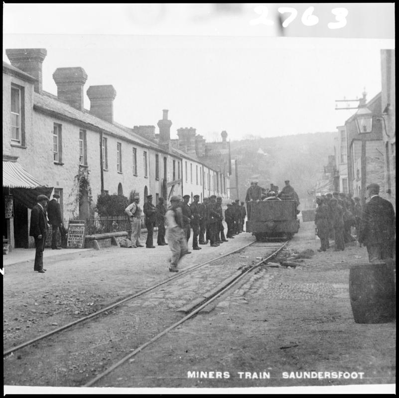 Black and white film negative showing a miners train, Saundersfoot.  &#039;Miners train Pembroke&#039; is transcribed from original negative bag.