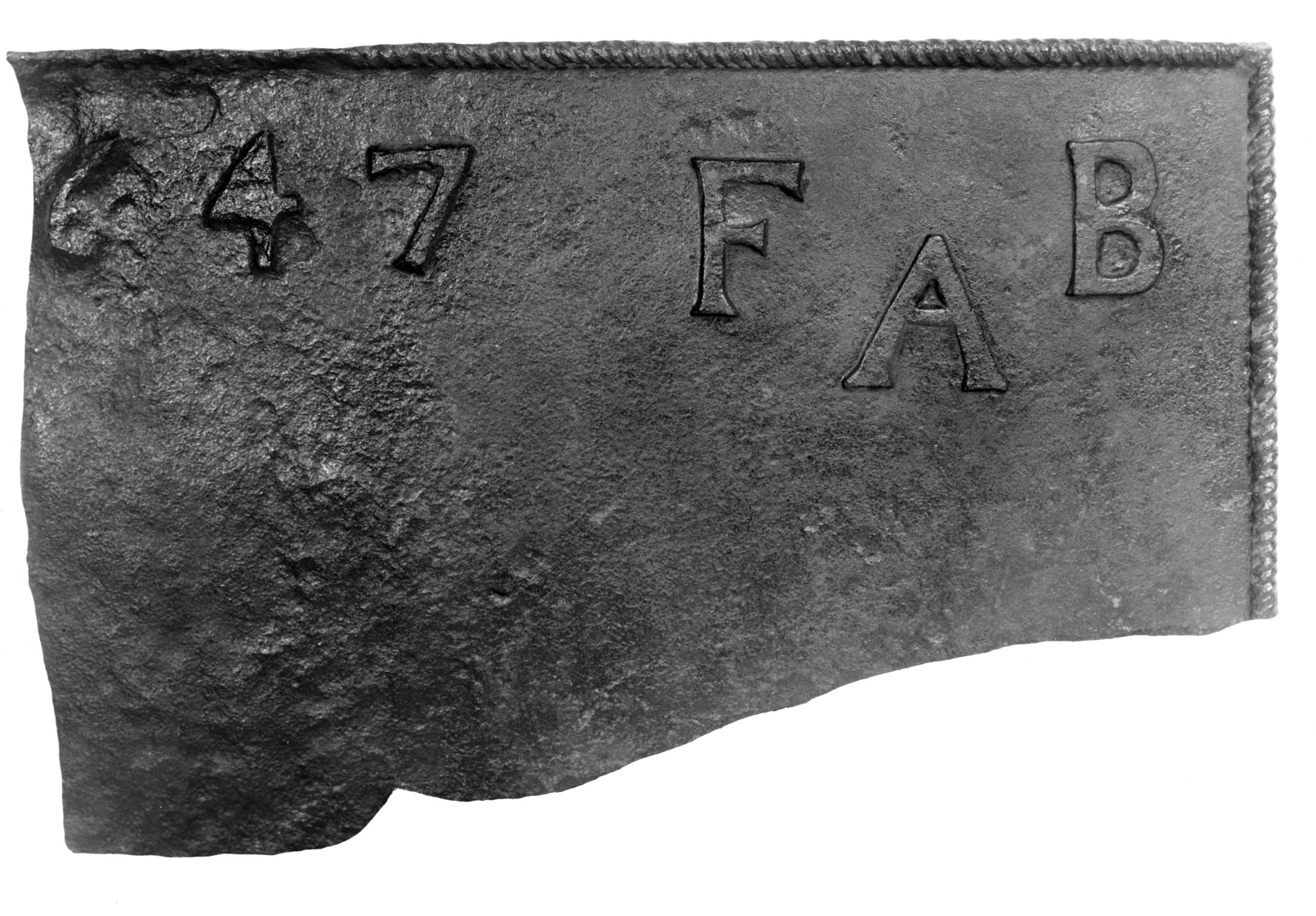 Cast iron fireback embossed 647 FAB