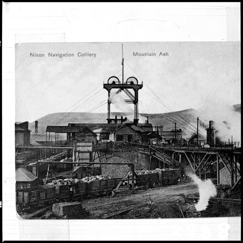 Black and white film negative of a photograph showing the headframe which was stabilised by steel cables, Nixon&#039;s Navigation Colliery c.1910.