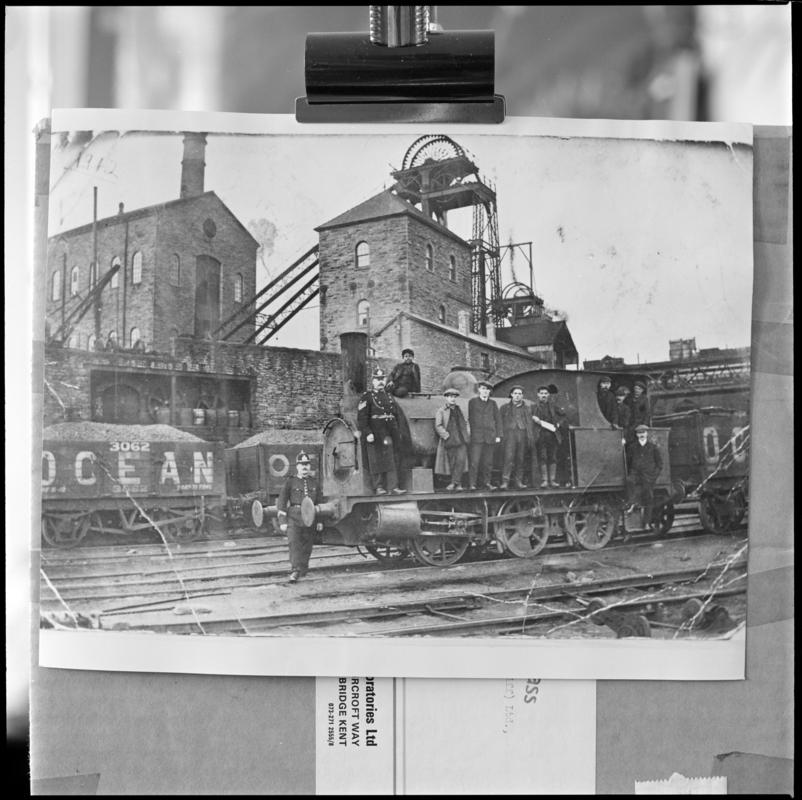 Black and white film negative of a photograph showing a group of men, some policemen, stood on a locomotive, Deep Navigation Colliery.  &#039;Deep Navigation&#039; is transcribed from original negative bag.