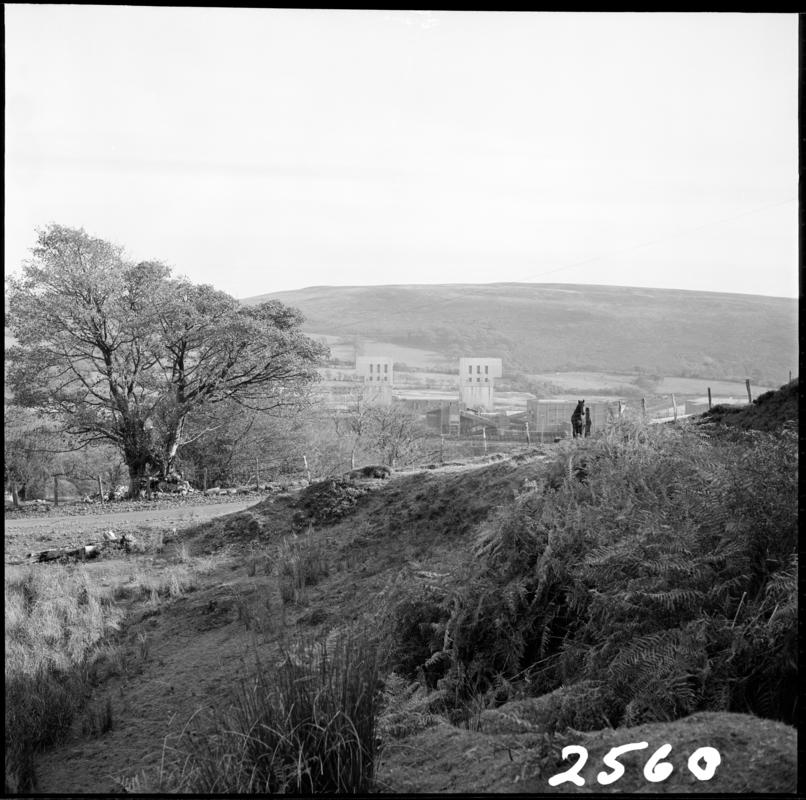 Black and white film negative showing a distant view of Abernant Colliery.  &#039;Abernant&#039; is transcribed from original negative bag.