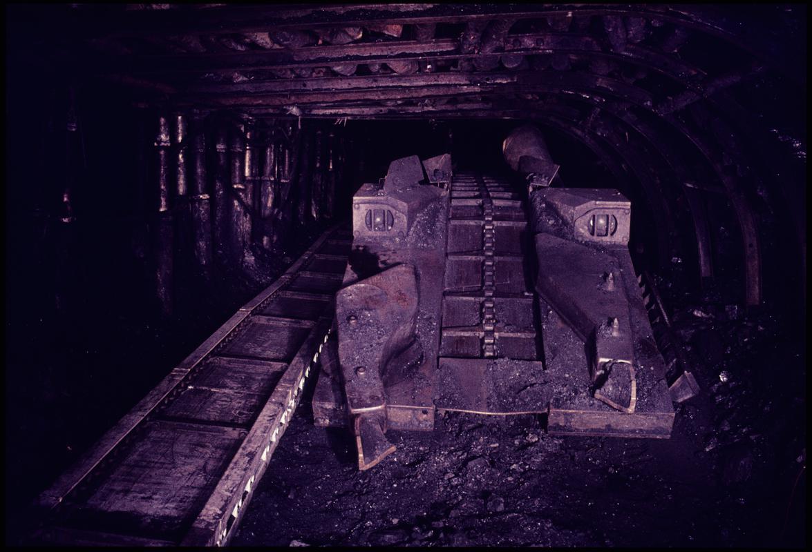 Colour film slide showing a gathering arm loader developing a new coalface, Celynen South Colliery.