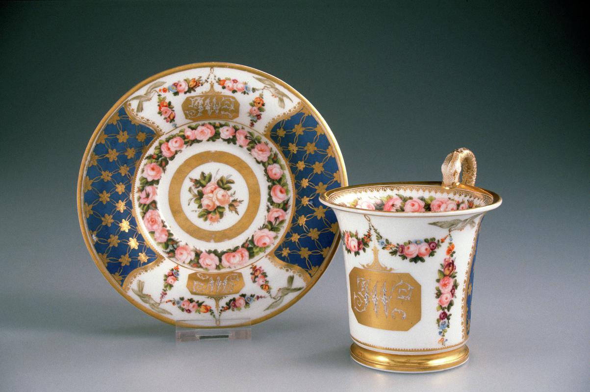 cup, cabinet and saucer