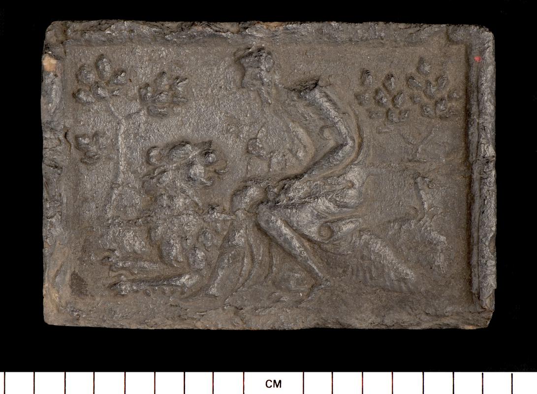 fire brick depicting Androcles and the lion