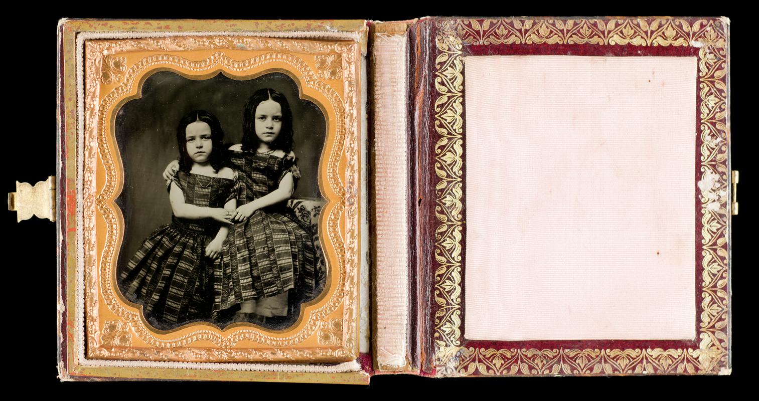Case with portrait of two young girls