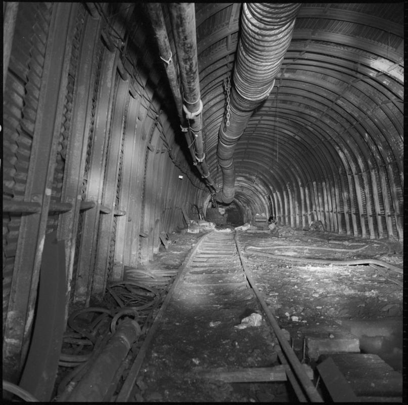 Black and white film negative showing an underground roadway, Nantgarw Colliery.