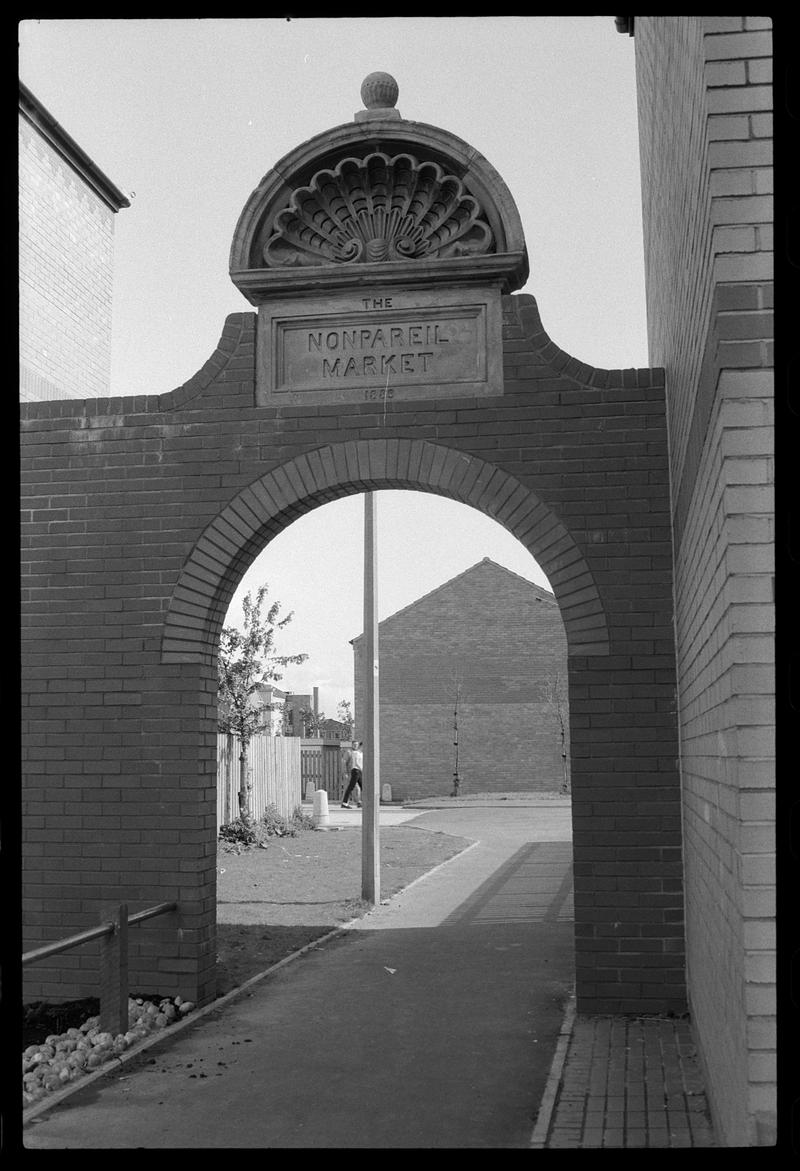 Archway inscribed &quot;The Nonpariel Market&quot;, between James Street and Louisa Place.