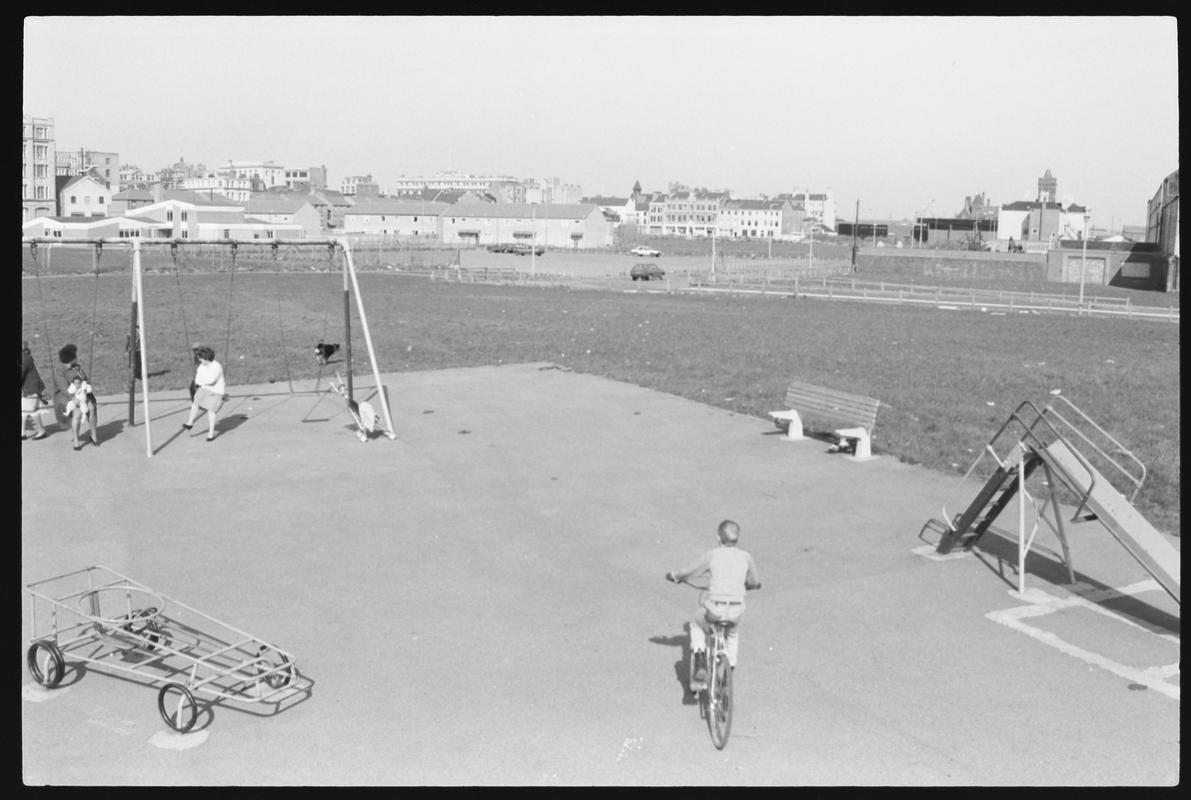 Children&#039;s playground at Louisa Place, with the Welsh Industrial and Maritime Museum building in background.