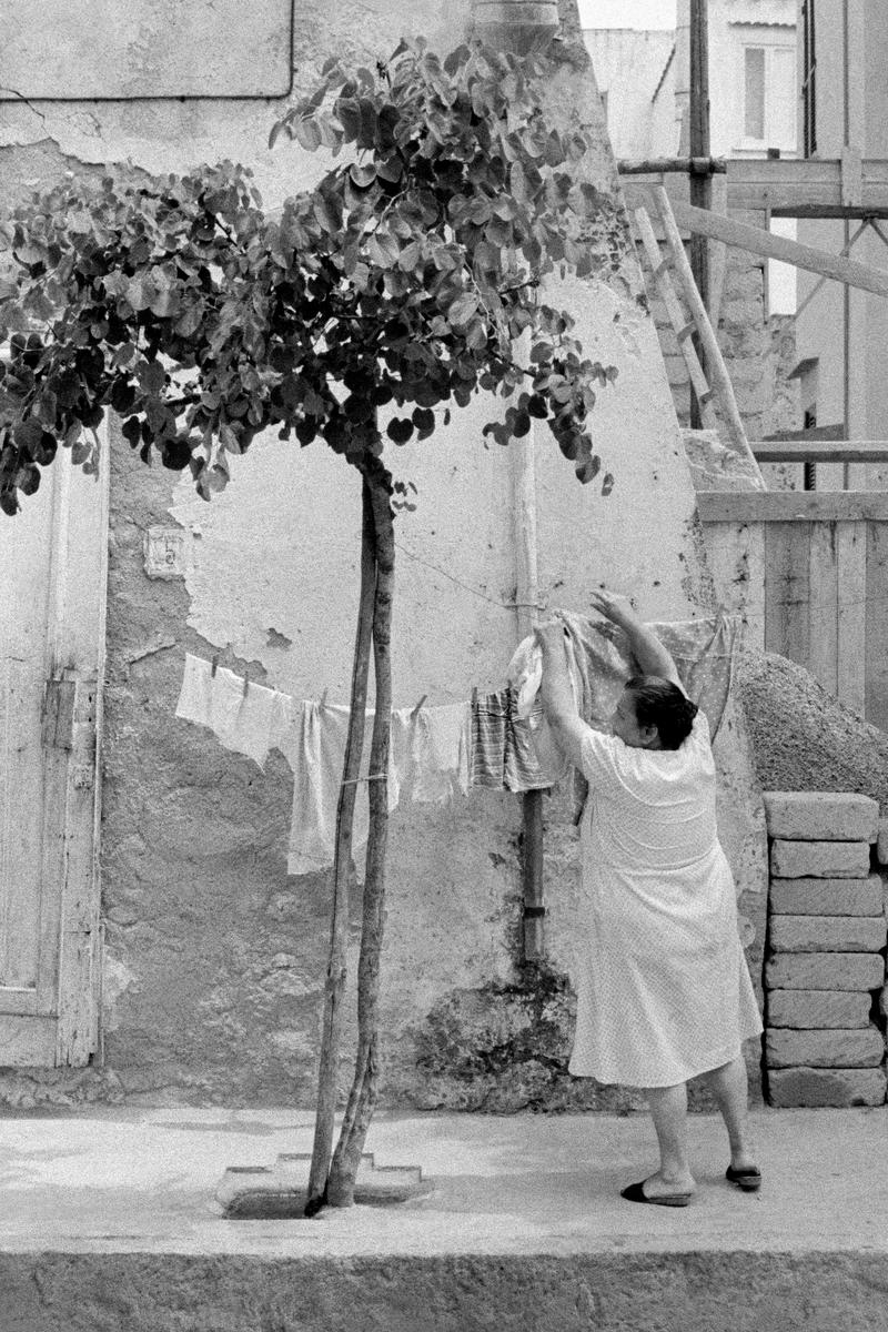 ITALY. Ischia. Hanging the washing in a side street. 1964.