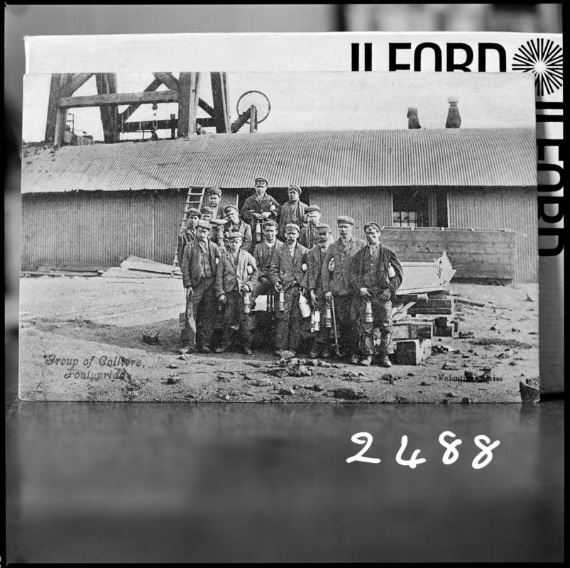 Black and white film negative showing a group of miners at Maritime Colliery c.1900, previously named Pontypridd Colliery.  &#039;Miners Pontypridd c.1900&#039; is transcribed from original negative bag.