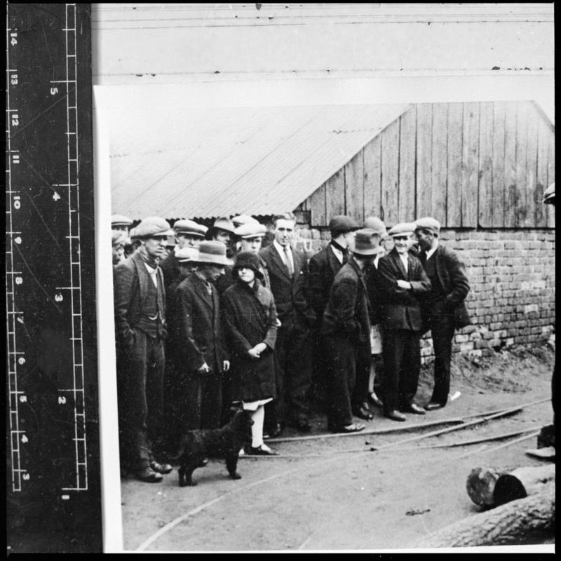 Black and white film negative of a photograph showing a group of miners on the surface, Milfraen Colliery, Blaenavon.  &#039;Milfraen&#039; is transcribed from original negative bag.