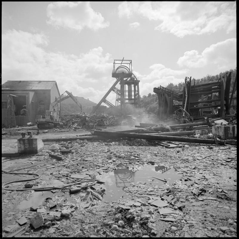 Black and white film negative of a photograph showing demolition at Celynen South Colliery, 1985.  &#039;South Celynen&#039; is transcribed from original negative bag.  Appears to be identical to 2009.3/2484.