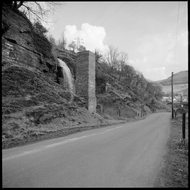 Black and white film negative showing a level and furnace stack, Trehafod, March 1980.  &#039;Level and furnace stack, Trehafod 3/80&#039; is transcribed from original negative bag.