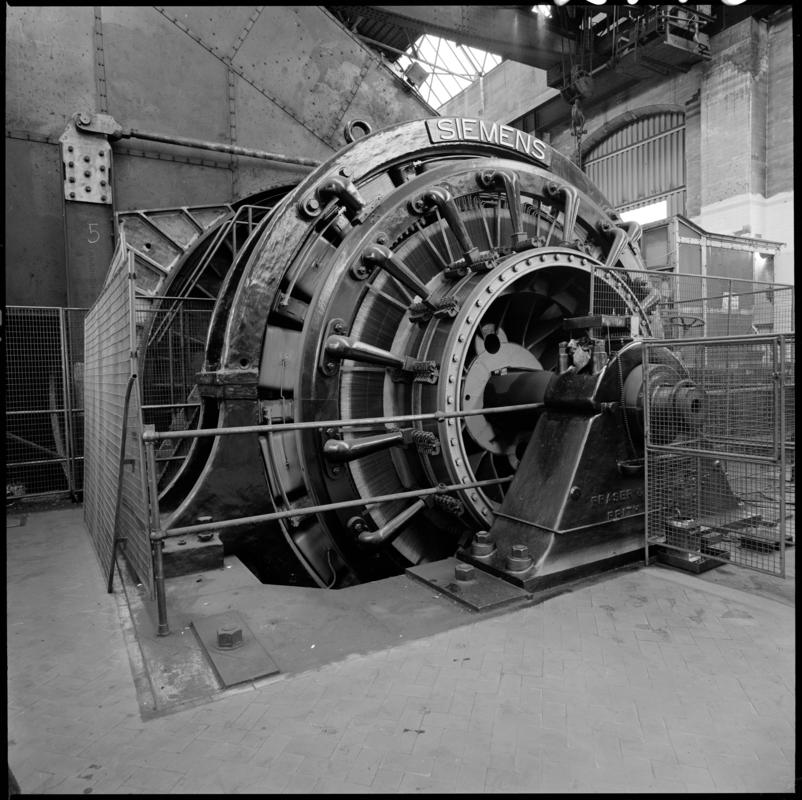 Black and white film negative showing the Siemens Electric winder which was installed at Britannia Colliery in 1910-1914 and worked until the closure of the colliery in 1983.  &#039;Britannia&#039; is transcribed from original negative bag.  Appears to be identical to 2009.3/2269 and 2009.3/2271.