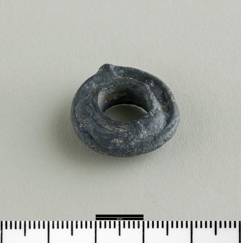 Early Medieval lead spindle whorl