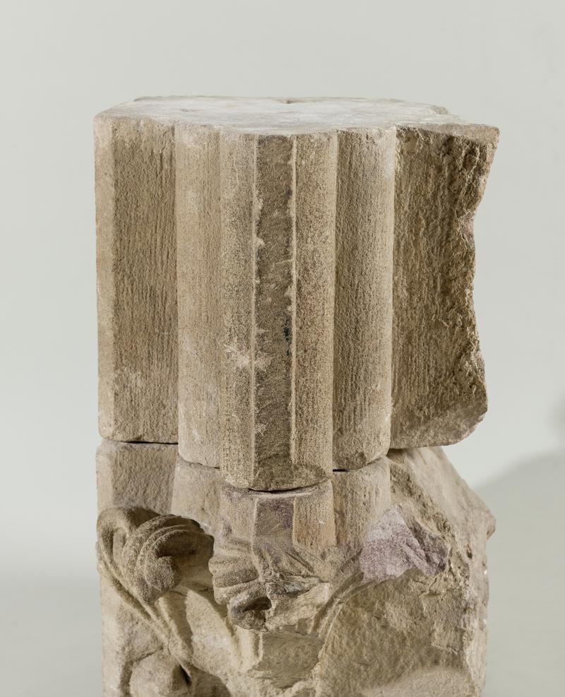 Medieval stone corbel - Part of the shaft of a column only. The fragments in the two record entries both preceding and following this one form part of the same column.