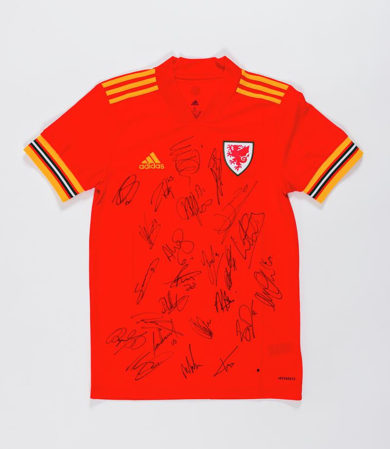 Football shirt signed after the Welsh national football team&#039;s match in Cardiff City Stadium against Hungary which has secured them the 2-0 qualifying victory to compete in the UEFA Euro 2020 Finals.
