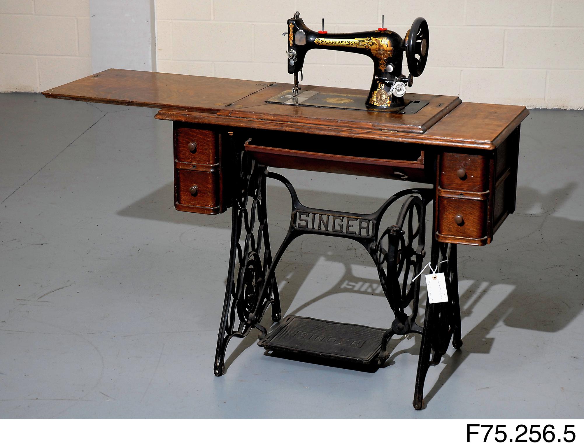 Sewing machine, treadle