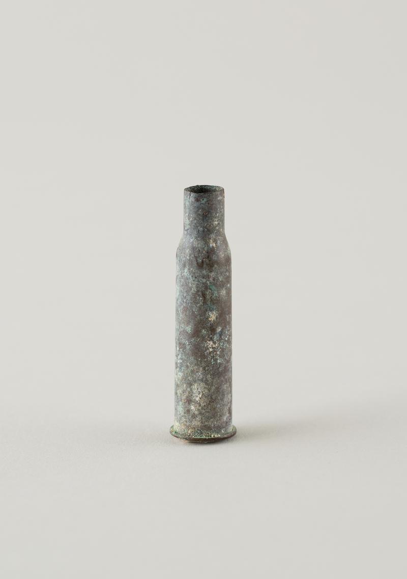 Cartridge case (spent) picked up on Jarama battlefield by donor, Mary Greening.