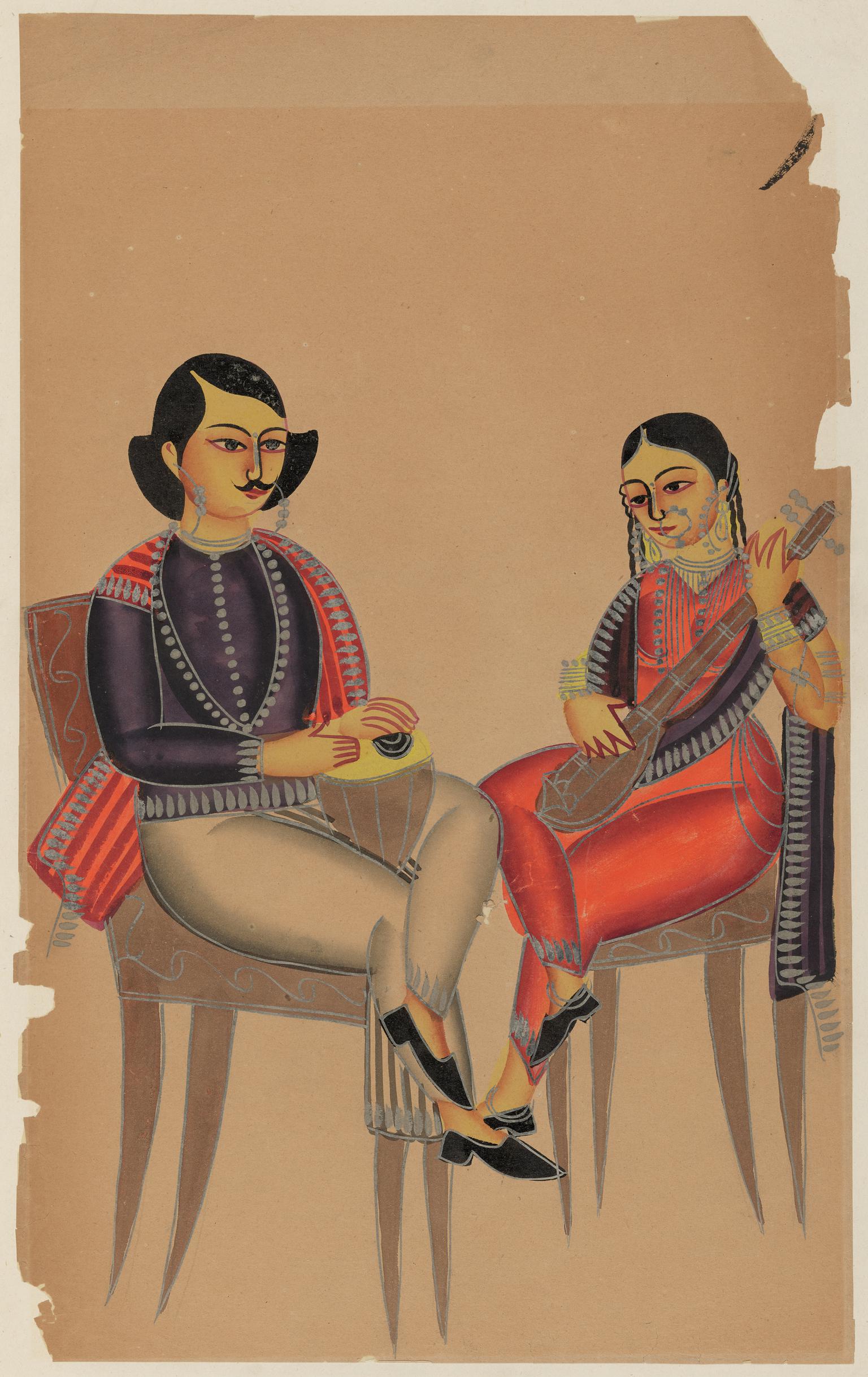 A girl playing the sitar seated with a young man who provides drum accompaniment