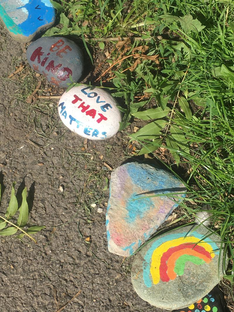 Detail of part of the line of painted pebbles in Castle Dell, Chepstow, Monmouthshire.