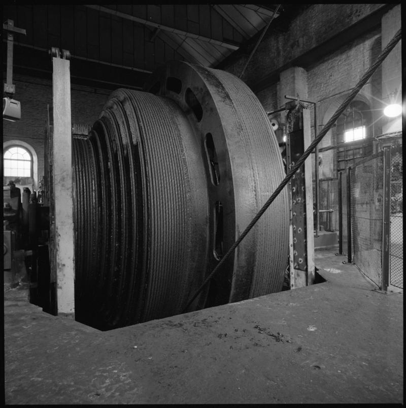 Black and white film negative showing the drum for the Trefor winding engine, Lewis Merthyr Colliery.  Appears to be identical to 2009.3/2700.