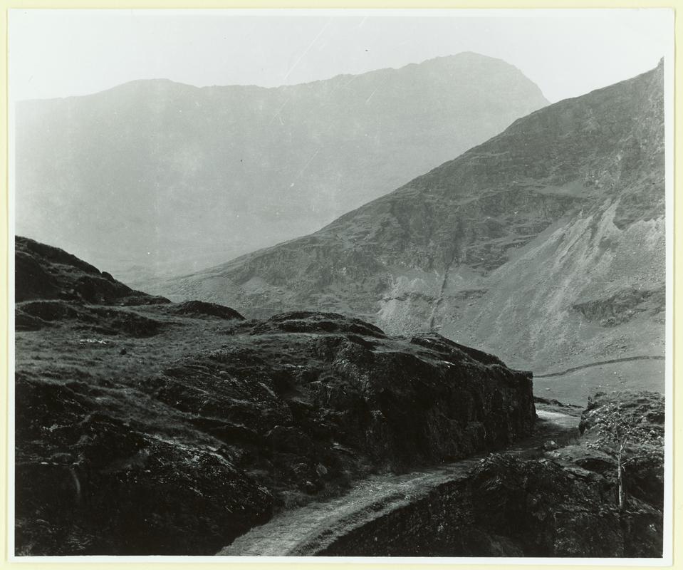 View of old quarry railway above Cwm y Llan, Snowdonia.



Print from film negative 2014.35/48.