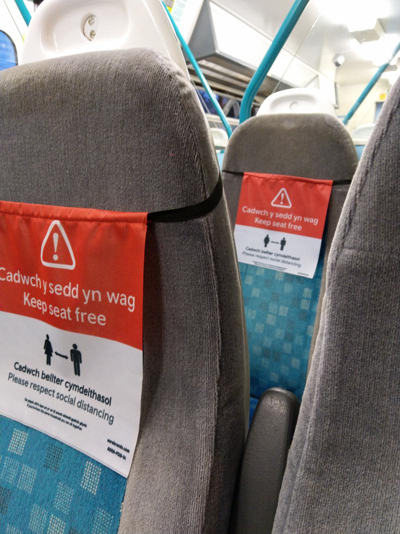 &#039;Keep seat free&#039; signs on Transport for Wales train between Radyr and Cardiff.