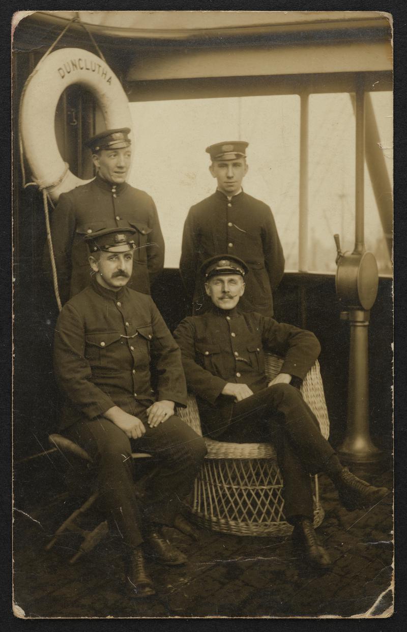 Photograph showing four crew members of the S.S. DUNCLUTHA.
