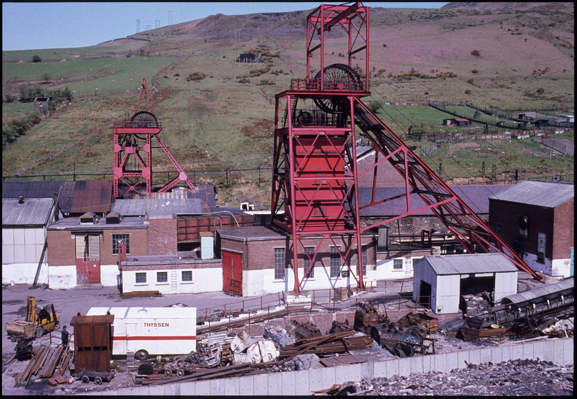Colour film slide showing the downcast and upcast headframes, Ocean Colliery.
