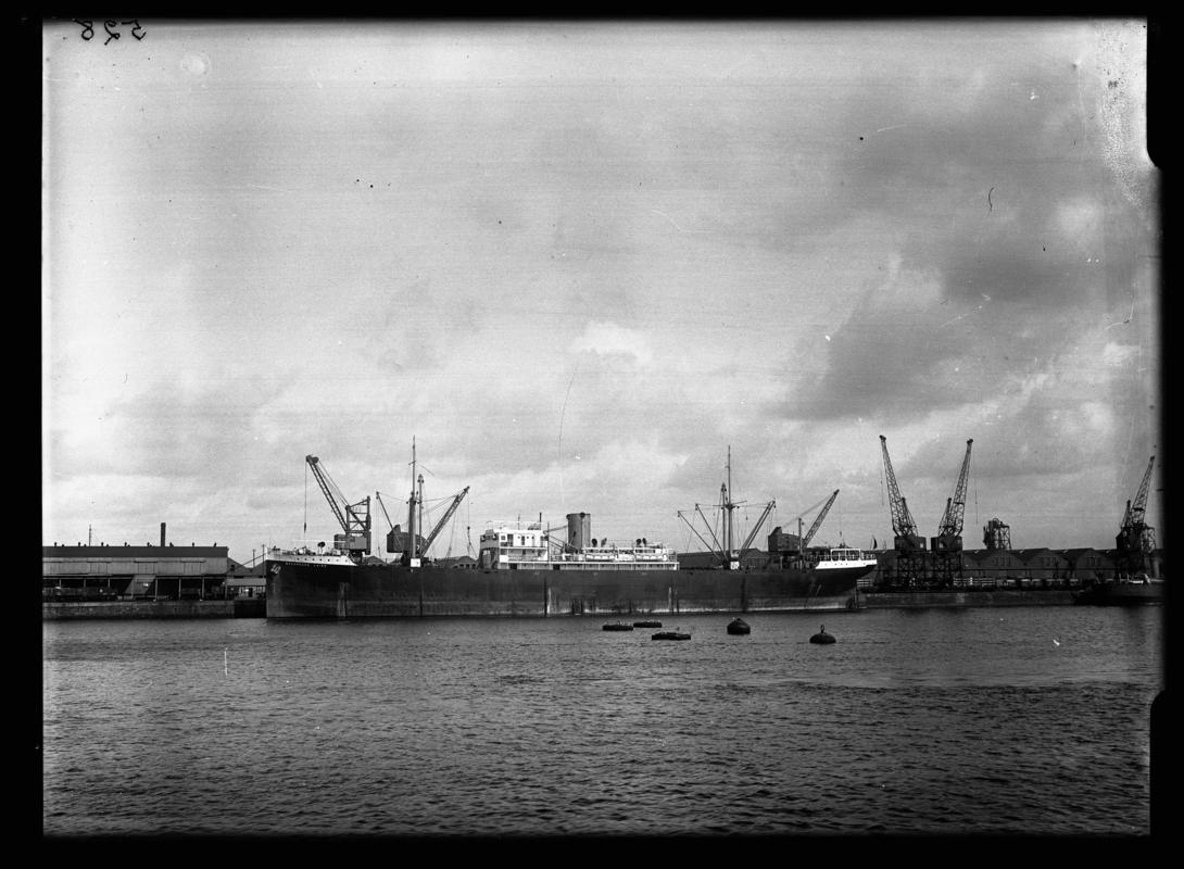 Port broadside view of M.V. MACGREGOR LAIRD at Cardiff Docks, c.1936.