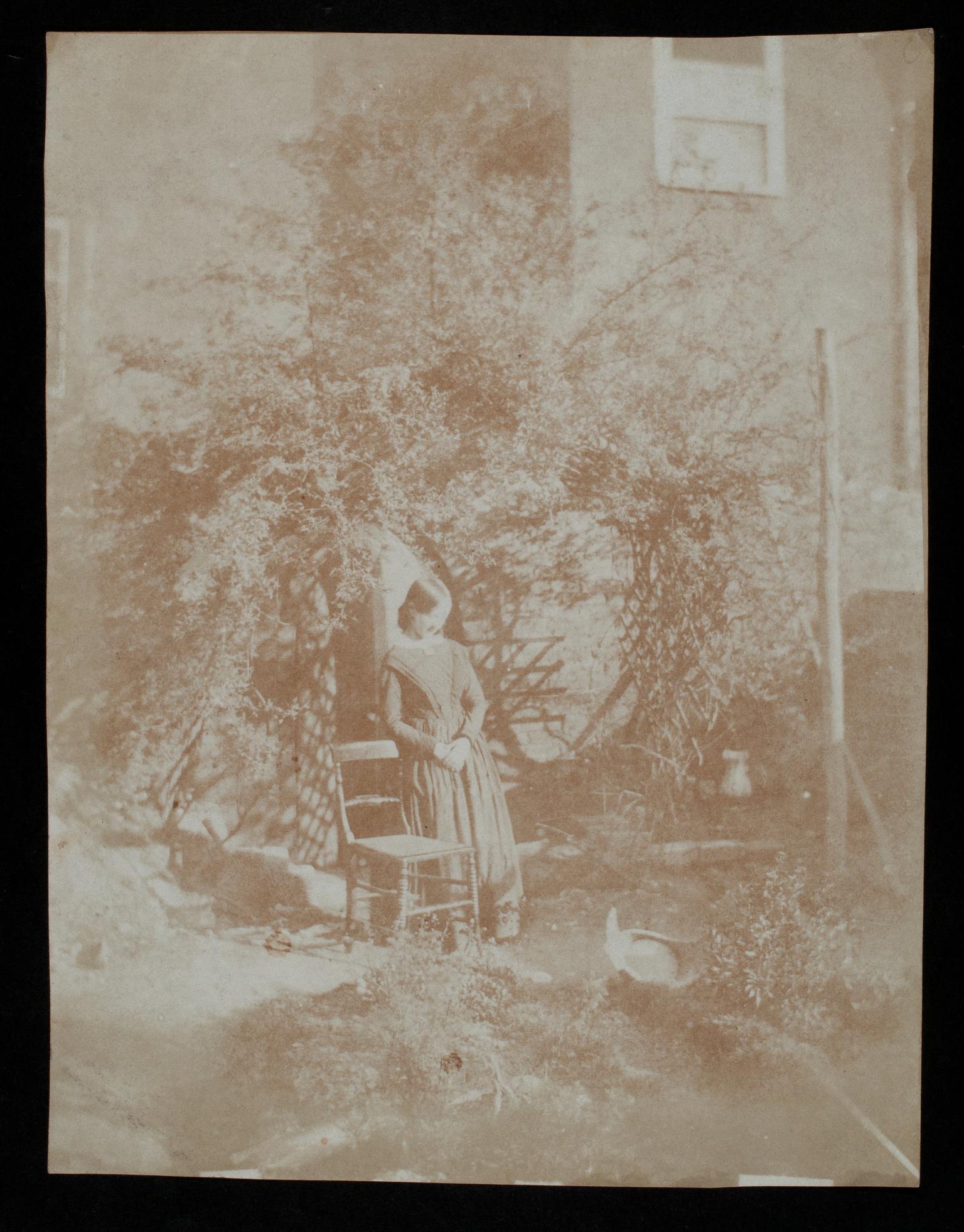 Lady in a garden, photograph