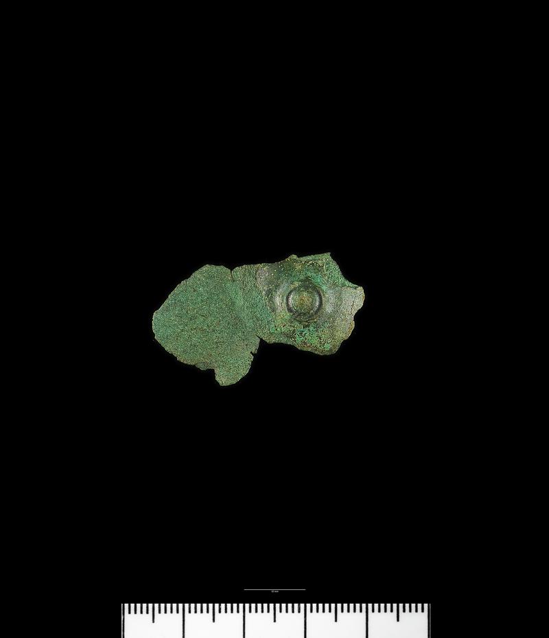 Late Bronze Age bronze domed and decorated plate fragment