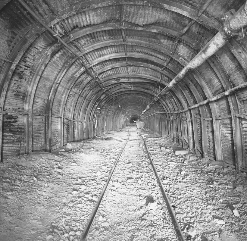 Black and white film negative showing an underground roadway, Oakdale Colliery, May 1980.  &#039;Oakdale May 1980&#039; is transcribed from original negative bag.