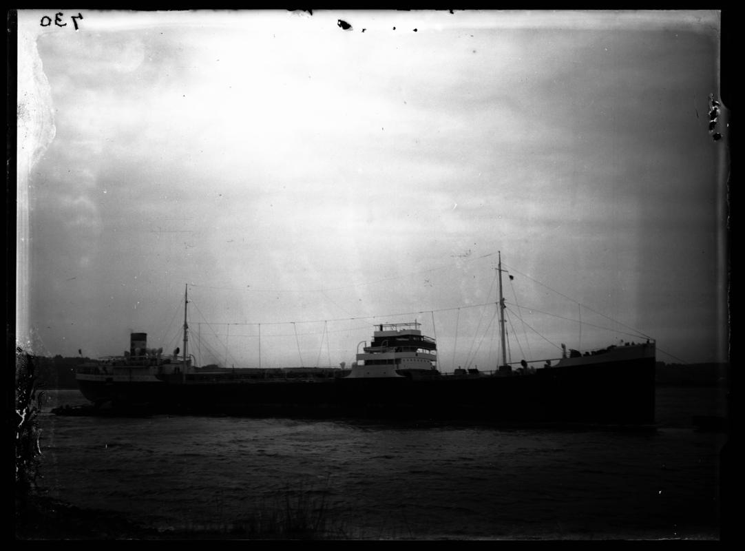 Starboard broadside view of M.V. ARAMIS and tug, c.1936