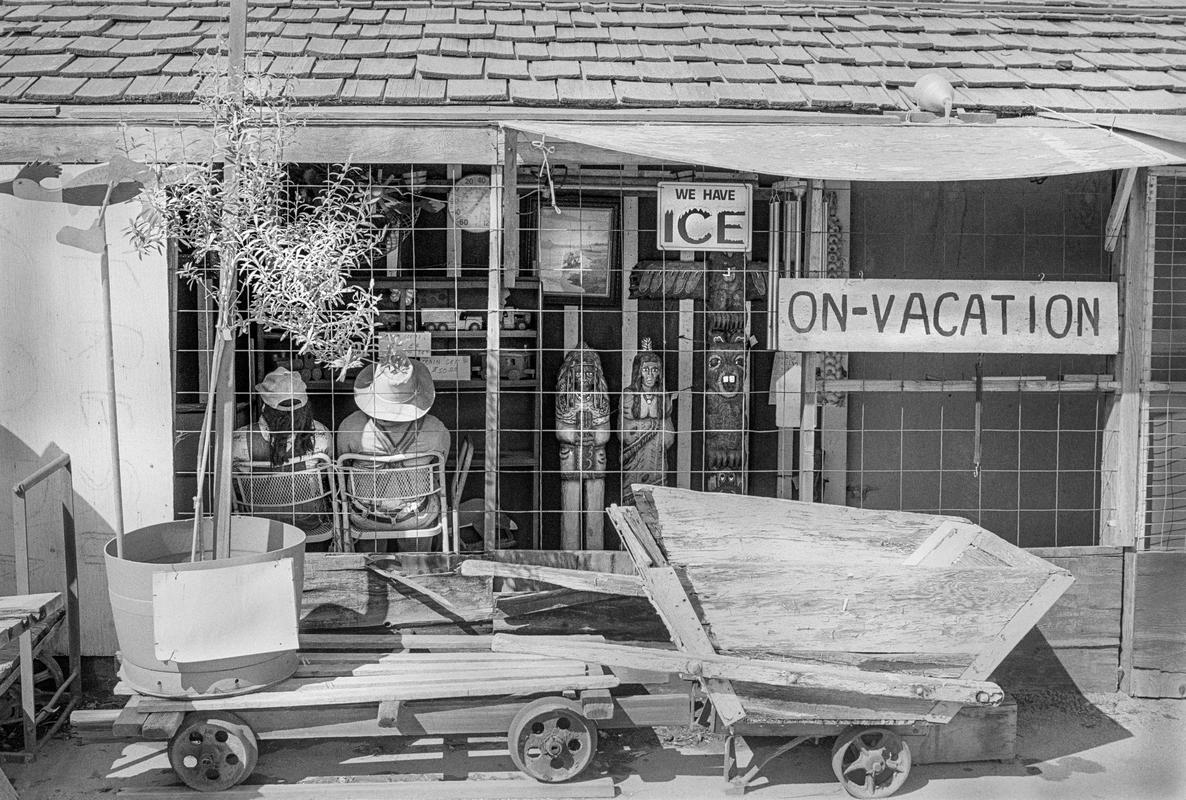 USA. CALIFORNIA. Shop front in Hollister a town on the San Andreas Fault. The town regularly hit by earthquakes. The people are efficient at clearing any sign of damage usually by the next day. 1991.