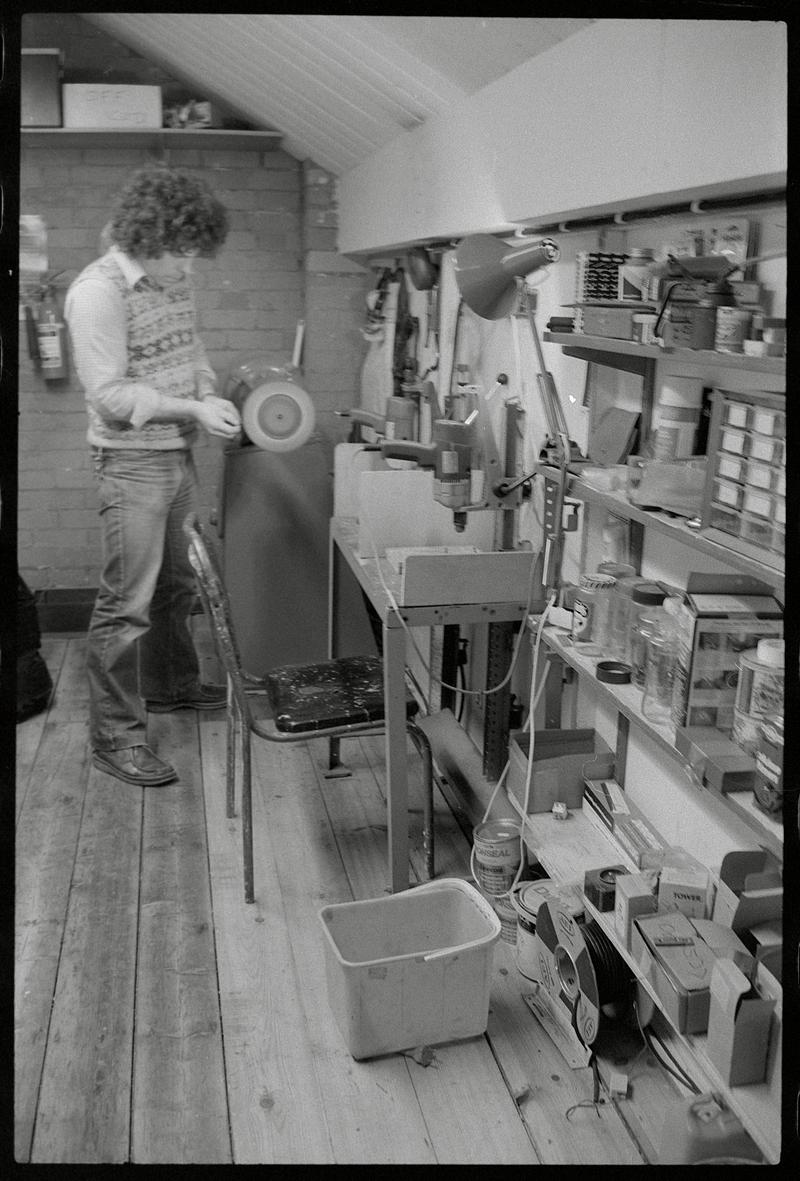 Craftsman working on a sundial.