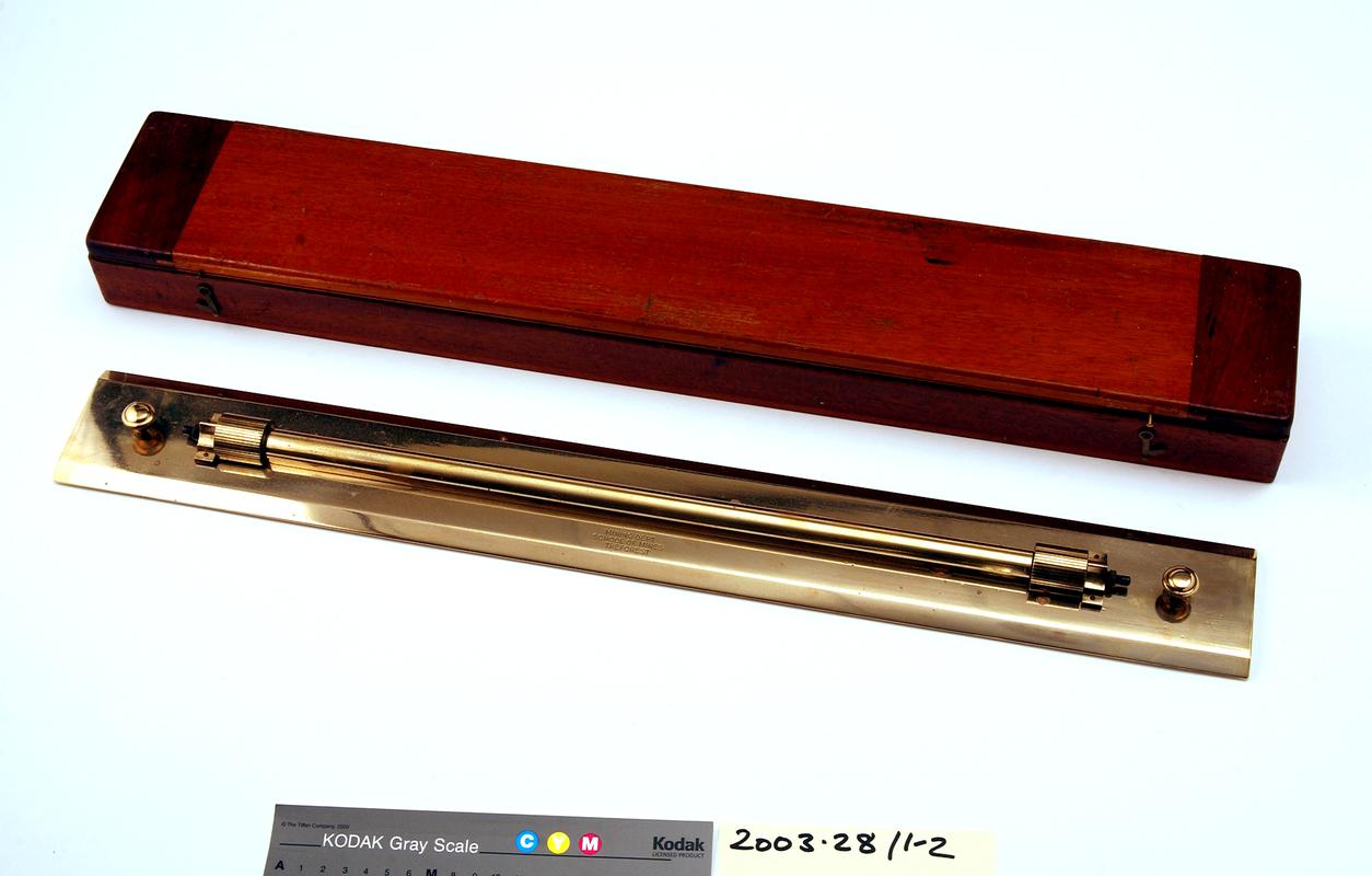 Brass rolling parallel rule and original wooden box