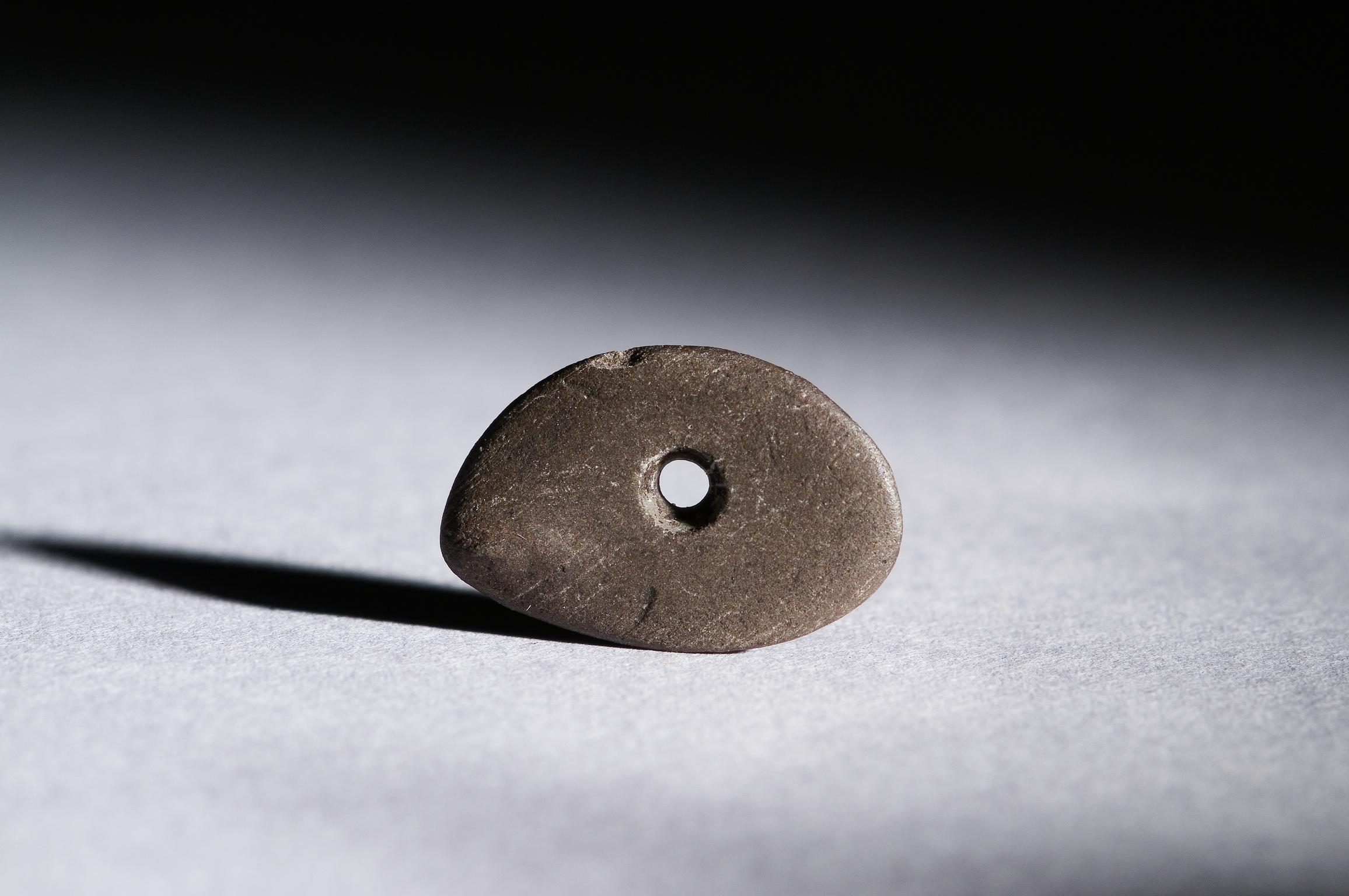 Early Mesolithic stone bead
