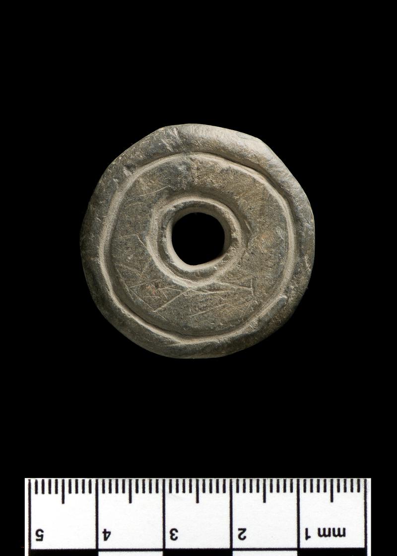 stone spindle whorl (obv)