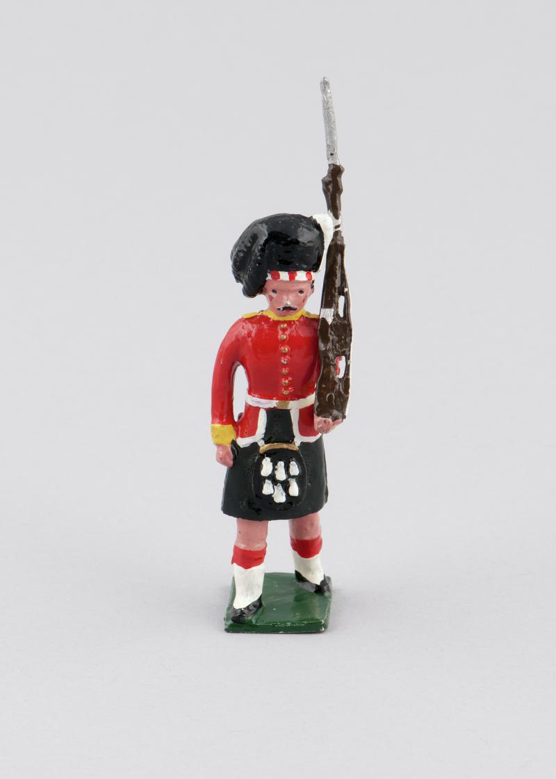 Model of an Argyll &amp; Sutherland Highlander with rifle of 1914. Left arm holds rifle and is moveable. Hand-painted.