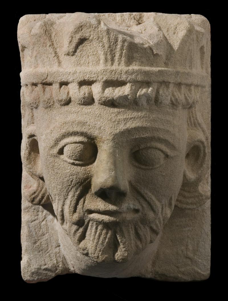 Medieval stone carved head