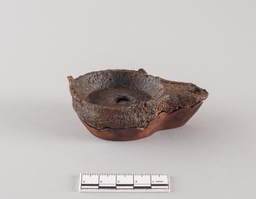 Roman iron oil lamp