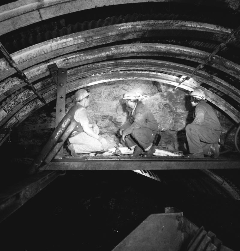 Black and white film negative showing a repair gang at work, Oakdale Colliery, May 1980.  &#039;Oakdale May 1980&#039; is transcribed from original negative bag.