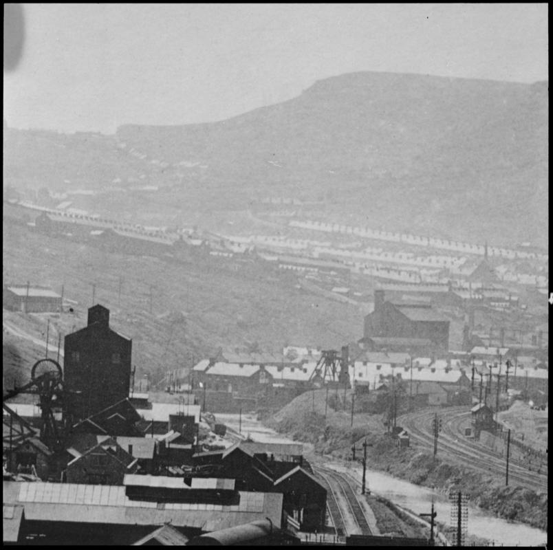 Black and white film negative showing a view looking down towards Lewis Merthyr Colliery.