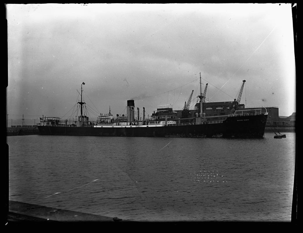 Starboard broadside view of S.S. BARON SCOTT at Cardiff docks, c.1948.